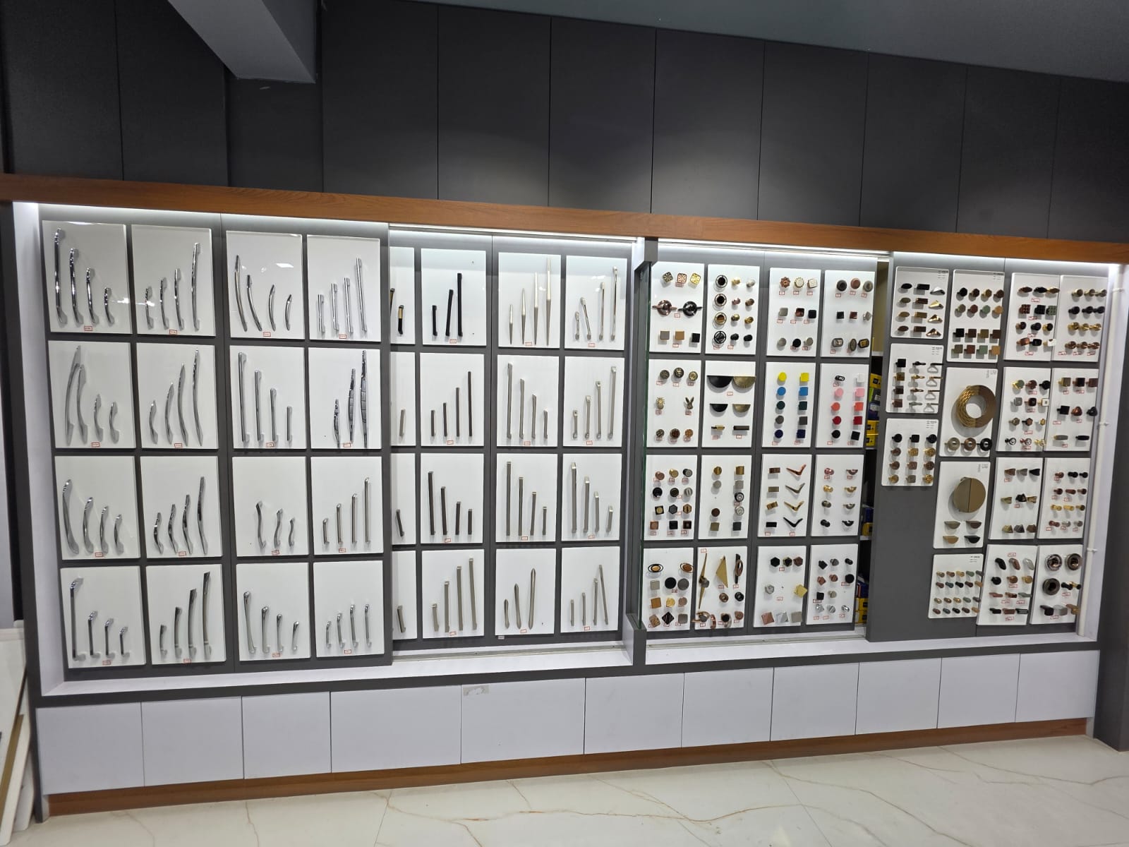 Cabinet Handles and Designer Knobs Display Wall in Hassan Showroom